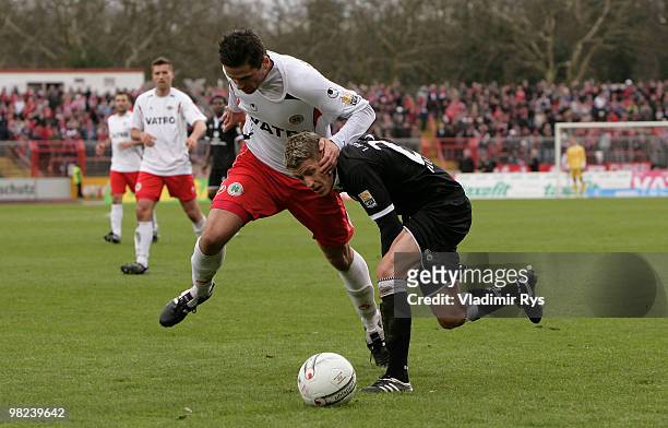 Marinko Miletic of Oberhausen defends Ivo Ilicevic of Kaiserslautern during the Second Bundesliga match between Rot-Weiss Oberhausen and 1. FC...