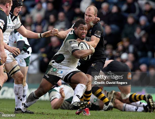 Steffon Armitage of London Irish is tackled by Mark van Gisbergen during the Guinness Premiership match between London Wasps and London Irish at...