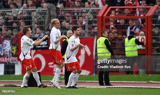 Heinrich Schmidtgal of Oberhausen celebrates with his team mates after scoring his team's first goal during the Second Bundesliga match between...