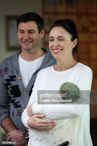 New Zealand Prime Minister Jacinda Ardern and partner Clarke Gayford pose for a photo with their new baby girl Neve Te Aroha Ardern Gayford on June...