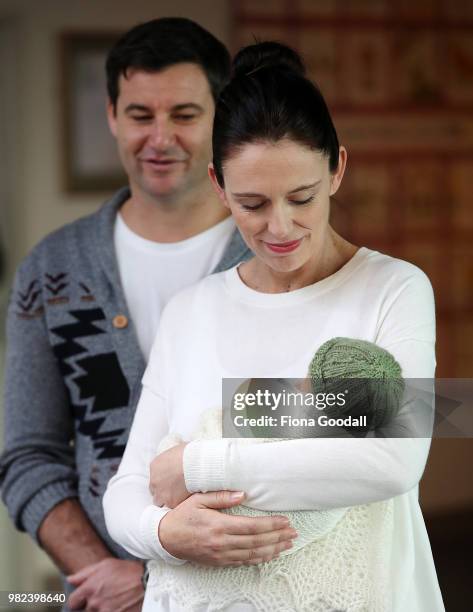 New Zealand Prime Minister Jacinda Ardern and partner Clarke Gayford pose for a photo with their new baby girl Neve Te Aroha Ardern Gayford on June...