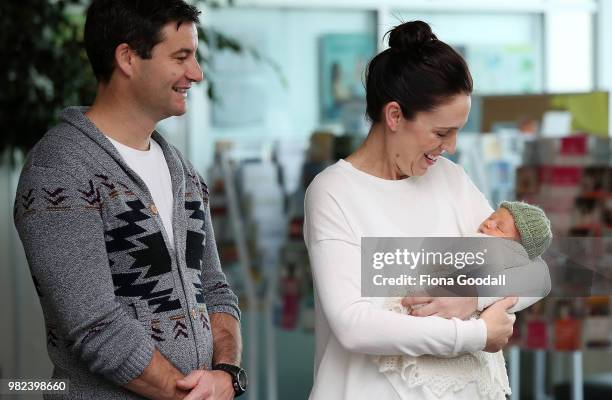 New Zealand Prime Minister Jacinda Ardern and partner Clarke Gayford pose for a photo with their new baby girl Neve Te Aroha Ardern Gayford on June...