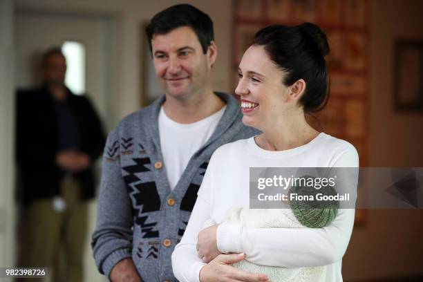 New Zealand Prime Minister Jacinda Ardern and partner Clarke Gayford pose for a photo with their new baby girl Neve Te Aroha Ardern Gayford on June...