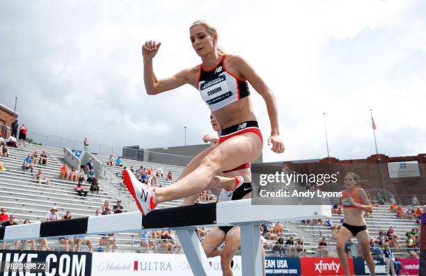 Emma Coburn clears a hurdle on the way to win the Womens 3,000 Meter Steeplechase Final during day 3 of the 2018 USATF Outdoor Championships at Drake...