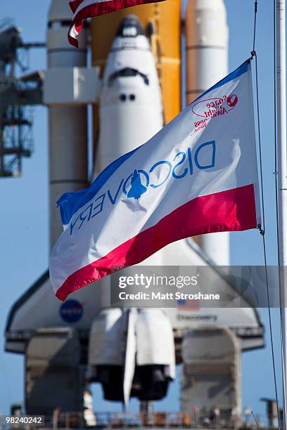 Space Shuttle Discovery sits on launch pad 39-A as the rotating service structure rolls back at Kennedy Space Center on April 4 in Cape Canaveral,...