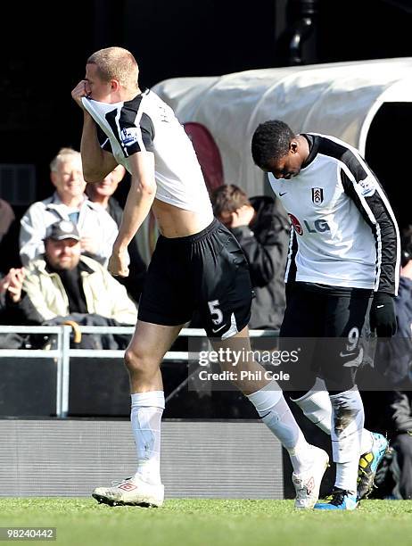 Brede Hangeland of Fulham celebrates scoring Fulham's second goal during the Barclays Premier League match between Fulham and Wigan Athletic at...