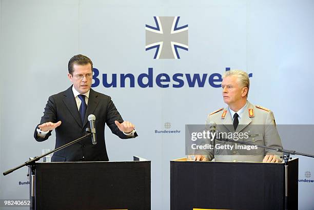 German Defense Minister Karl-Theodor zu Guttenberg and General Volker Wieker make a statement about the latest gun battle between Bundeswehr soldiers...
