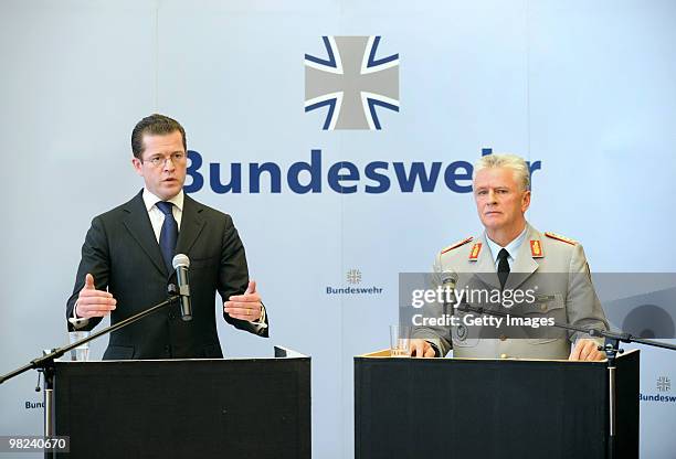 German Defense Minister Karl-Theodor zu Guttenberg and General Volker Wieker make a statement about the latest gun battle between Bundeswehr soldiers...