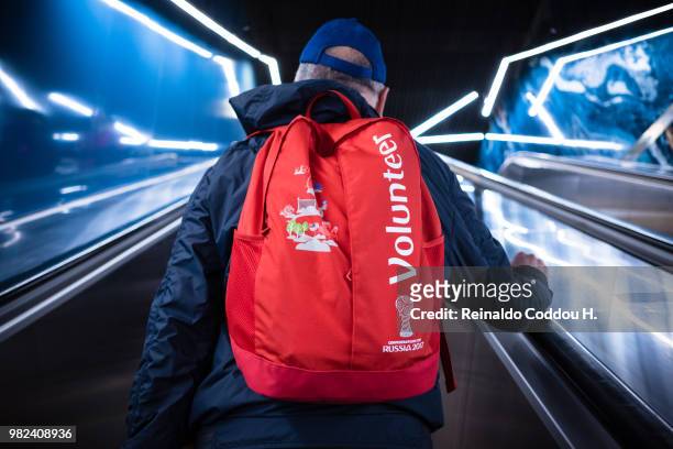 Volunteer rides an escalator of the metro on his way to the stadium priot to the 2018 FIFA World Cup Russia group E match between Brazil and Costa...