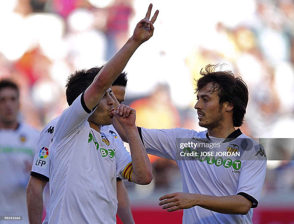 Valencia's forward David Villa (L) celeb