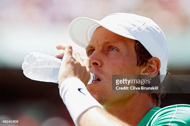 Tomas Berdych of the Czech Republic takes a drink of water while playing against Andy Roddick of the United States during the men's final of the 2010...