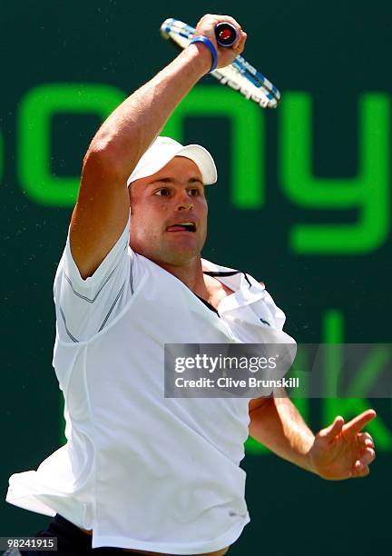 Andy Roddick of the United States returns a shot against Tomas Berdych of the Czech Republic during the men's final of the 2010 Sony Ericsson Open at...