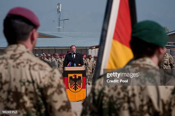 German development minister Dirk Niebel and German troops honor three killed Bundeswehr soldiers from the German state of Lower Saxony at a ceremony...