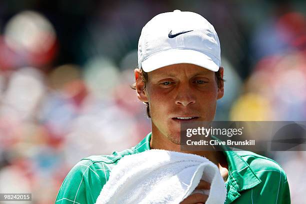 Tomas Berdych of the Czech Republic looks on against Andy Roddick of the United States during the men's final of the 2010 Sony Ericsson Open at...