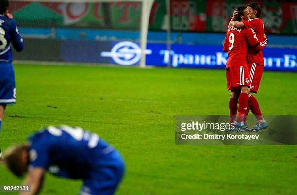 Peter Odemwingie and Tomislav Dujmovic of FC Lokomotiv Moscow celebrate after their victory over FC Dynamo Moscow in the Russian Football League...