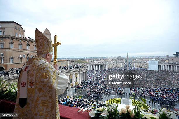 Pope Benedict XVI delivers his Easter 'Urbi et Orbi' blessing from the central balcony of St Peter's Basilica on April 04, 2010 in Vatican City,...