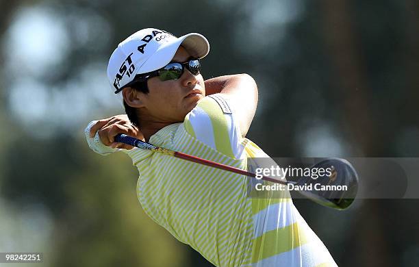 Yani Tseng of Taiwan plays her tee shot on the third hole during the final round of the 2010 Kraft Nabisco Championship, on the Dinah Shore Course at...