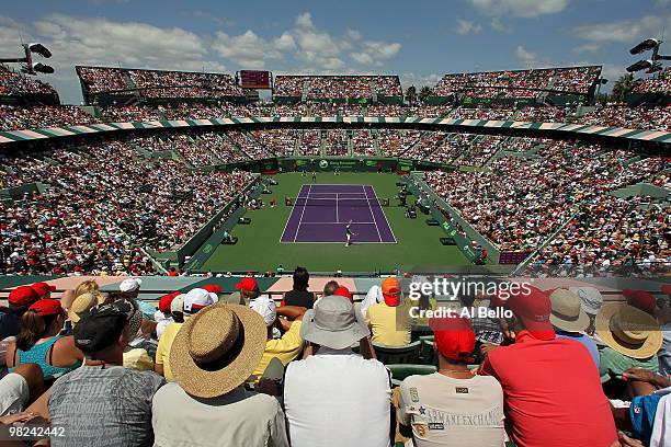 Fans watch as Andy Roddick of the United States plays against Tomas Berdych of the Czech Republic during the men's final of the 2010 Sony Ericsson...