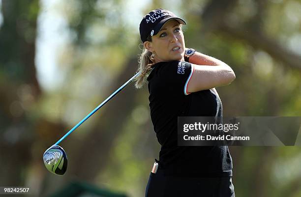 Cristie Kerr of the USA plays her tee shot on the third hole during the final round of the 2010 Kraft Nabisco Championship, on the Dinah Shore Course...