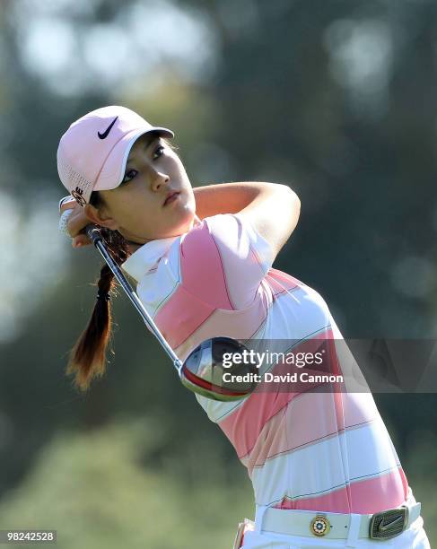 Michelle Wie of the USA plays her tee shot on the third hole during the final round of the 2010 Kraft Nabisco Championship, on the Dinah Shore Course...