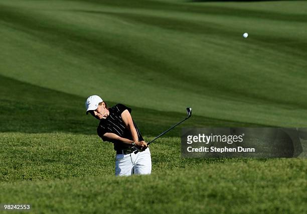 Catriona Matthew of Scotland hits from the rough on the second hole during the final round of the Kraft Nabisco Championship at Mission Hills Country...