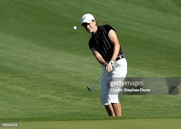 Catriona Matthew of Scotland chips onto the green on the second hole during the final round of the Kraft Nabisco Championship at Mission Hills...