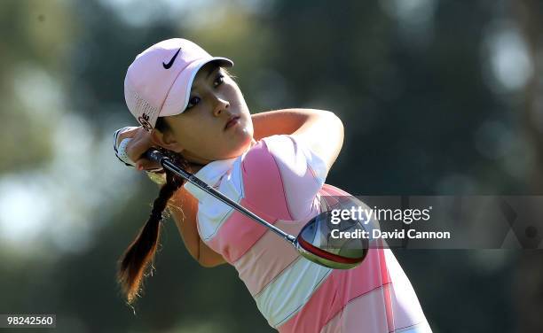 Michelle Wie of the USA plays her tee shot on the third hole during the final round of the 2010 Kraft Nabisco Championship, on the Dinah Shore Course...