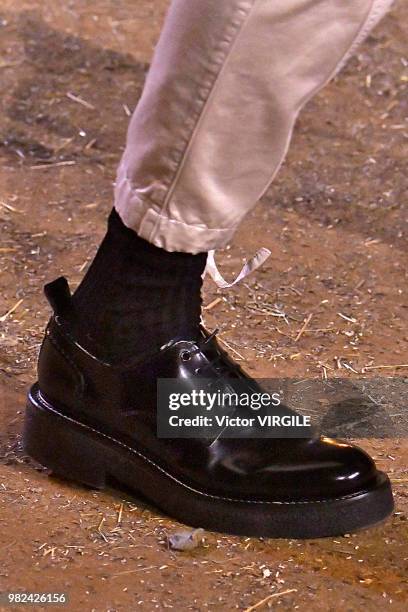 Model walks the runway during the AMI Alexandre Mattiussi Menswear Spring/Summer 2019 fashion show as part of Paris Fashion Week on June 21, 2018 in...