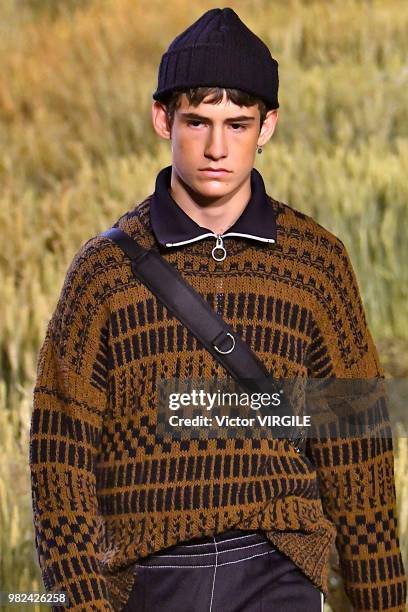 Model walks the runway during the AMI Alexandre Mattiussi Menswear Spring/Summer 2019 fashion show as part of Paris Fashion Week on June 21, 2018 in...