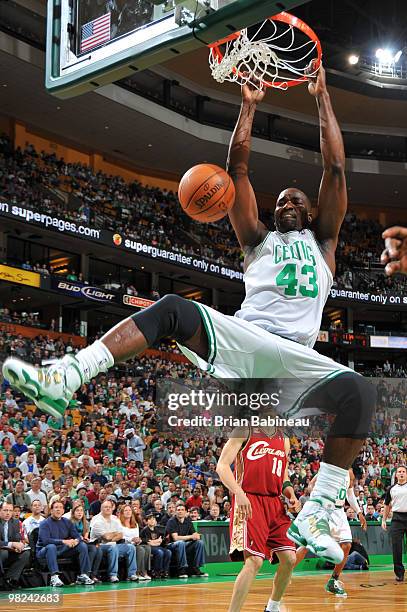 Kendrick Perkins of the Boston Celtics dunks the ball during the game against the Cleveland Cavaliers on April 4, 2010 at the TD Garden in Boston,...