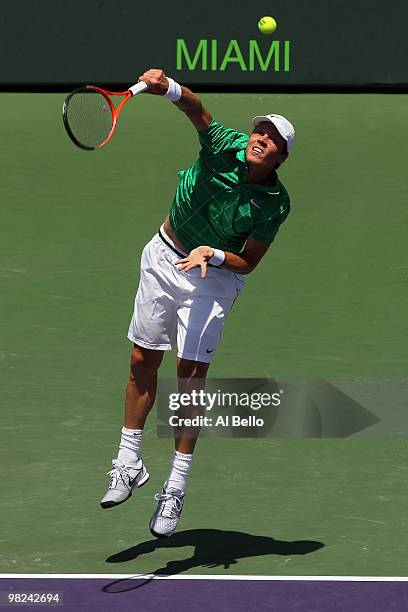 Tomas Berdych of the Czech Republic serves against Andy Roddick of the United States during the men's final of the 2010 Sony Ericsson Open at Crandon...