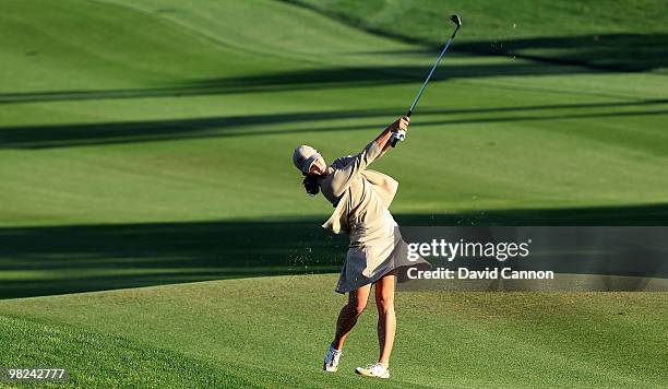 Paige Mackenzie of the USA plays her third shot on the second hole during the final round of the 2010 Kraft Nabisco Championship, on the Dinah Shore...