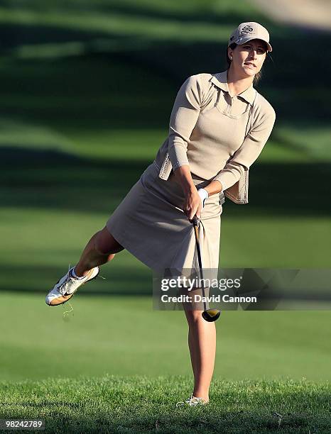 Paige Mackenzie of the USA plays her second shot on the second hole during the final round of the 2010 Kraft Nabisco Championship, on the Dinah Shore...