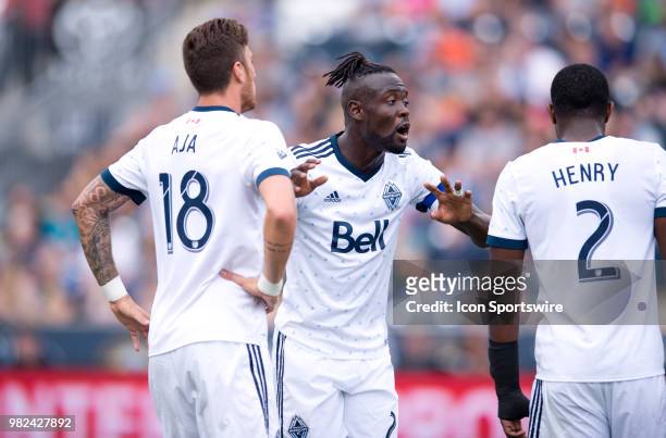 Whitecaps Forward Kei Kamara sets up Defender Jose Aja and Defender Doneil Henry for a corner kick in the first half during the game between...