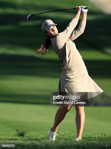 Paige Mackenzie of the USA plays her second shot on the second hole during the final round of the 2010 Kraft Nabisco Championship, on the Dinah Shore...