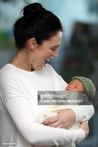 New Zealand Prime Minister Jacinda Ardern holds her baby daugther Neve Te Aroha Ardern Gayford outside the hospital in Auckland on June 24, 2018. -...