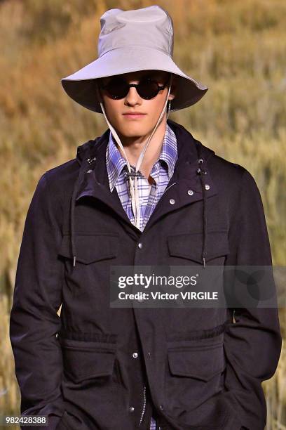 Model walks the runway during the AMI Alexandre Mattiussi Menswear Spring/Summer 2019 fashion show as part of Paris Fashion Week on June 21, 2018 in...