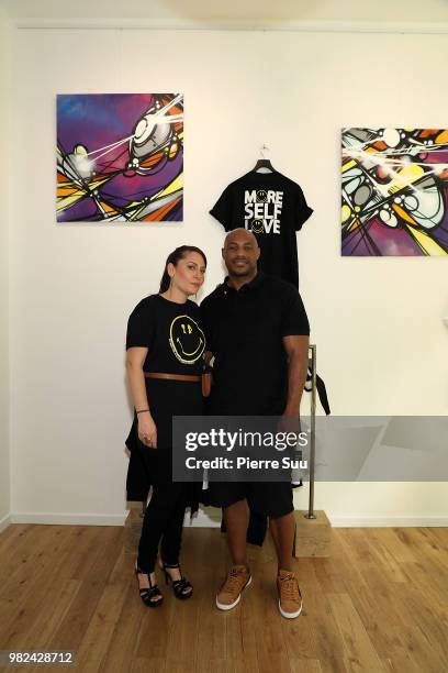 Stacy Igel and Kareem Burke attend the Boy Meets Girl - Black Label X Smiley Original as part of Paris Fashion Week on June 23, 2018 in Paris, France.