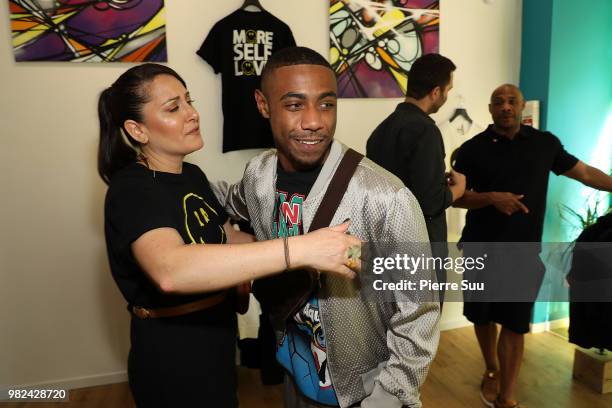 Brian Igel, Stacy Igel Kareem Burke jr and Kareem Burke attend the Boy Meets Girl - Black Label X Smiley Original as part of Paris Fashion Week on...