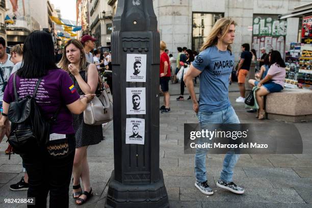 Pictures of members of "La Manada" gang are seen in Puerta del Sol after court's decision to release the gang on bail. The gang assaulted a woman, 18...