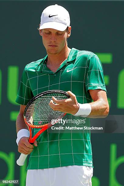 Tomas Berdych of the Czech Republic looks on against Andy Roddick of the United States during the men's final of the 2010 Sony Ericsson Open at...