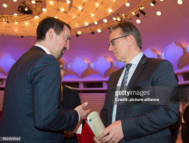 Holger Muench , President of the Federal Criminal Police Office, speaks with Andreas Kleinknecht, division manager Public Clients Germany, Microsoft...