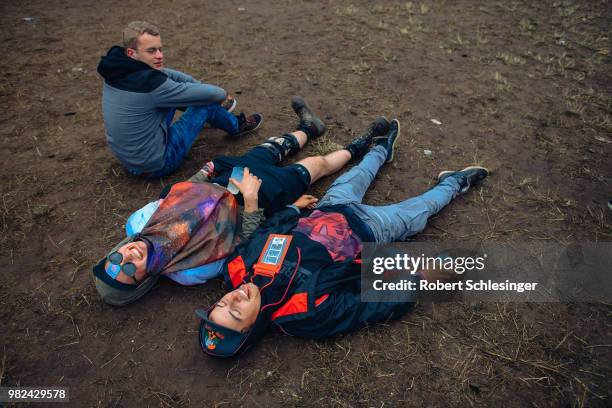 Drunken festival goers during during the second day of the Hurricane festival on June 23, 2018 in Scheessel, Germany.