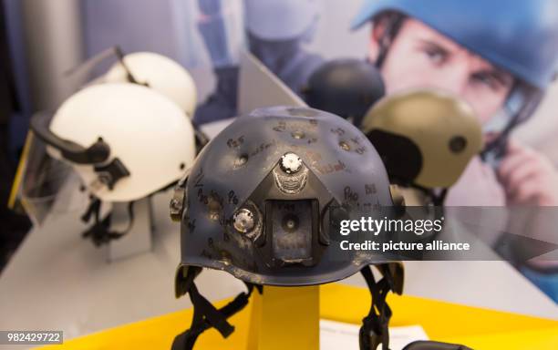 The helmet manufacturer Ulbrichts Protection displays a helmet which was shot several times at an exhibition of the European Police Congress in...