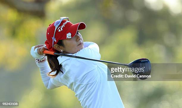 Shinobu Moromizato of Japan plays her tee shot on the third hole during the final round of the 2010 Kraft Nabisco Championship, on the Dinah Shore...