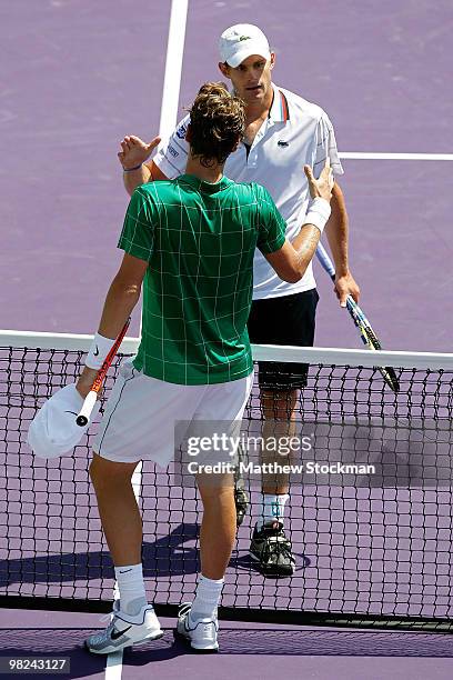 Andy Roddick of the United States greets Tomas Berdych of the Czech Republic after defeating him in straight sets to win the men's final of the 2010...
