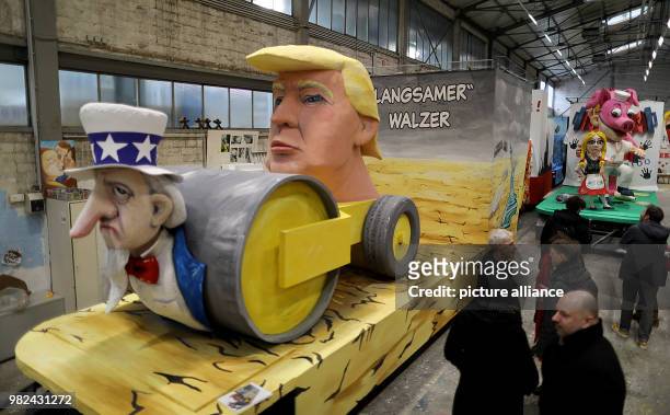 Theme wagon with a caricature depicting US President Donald Trump on display as part of the preparations for the Rose Monday Parade at the wagon...