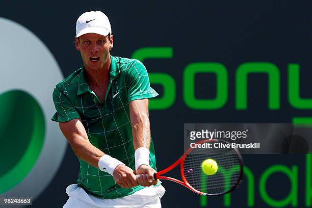 Tomas Berdych of the Czech Republic returns a shot against Andy Roddick of the United States during the men's final of the 2010 Sony Ericsson Open at...