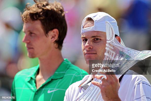 Andy Roddick of the United States and Tomas Berdych of the Czech Republic hold their trophies after the men's final of the 2010 Sony Ericsson Open at...