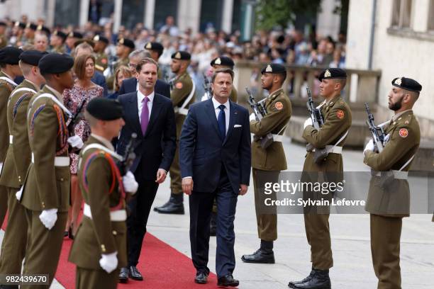 Luxembourg's Prime Minister Xavier Bettel and his husband arrive for Te Deum for National Day at Notre Dame du Luxembourg cathedral on June 23, 2018...